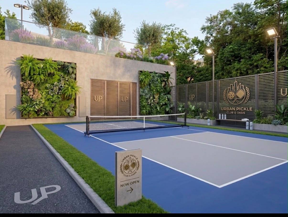 Urban Pickle outdoor court surrounded by greenery